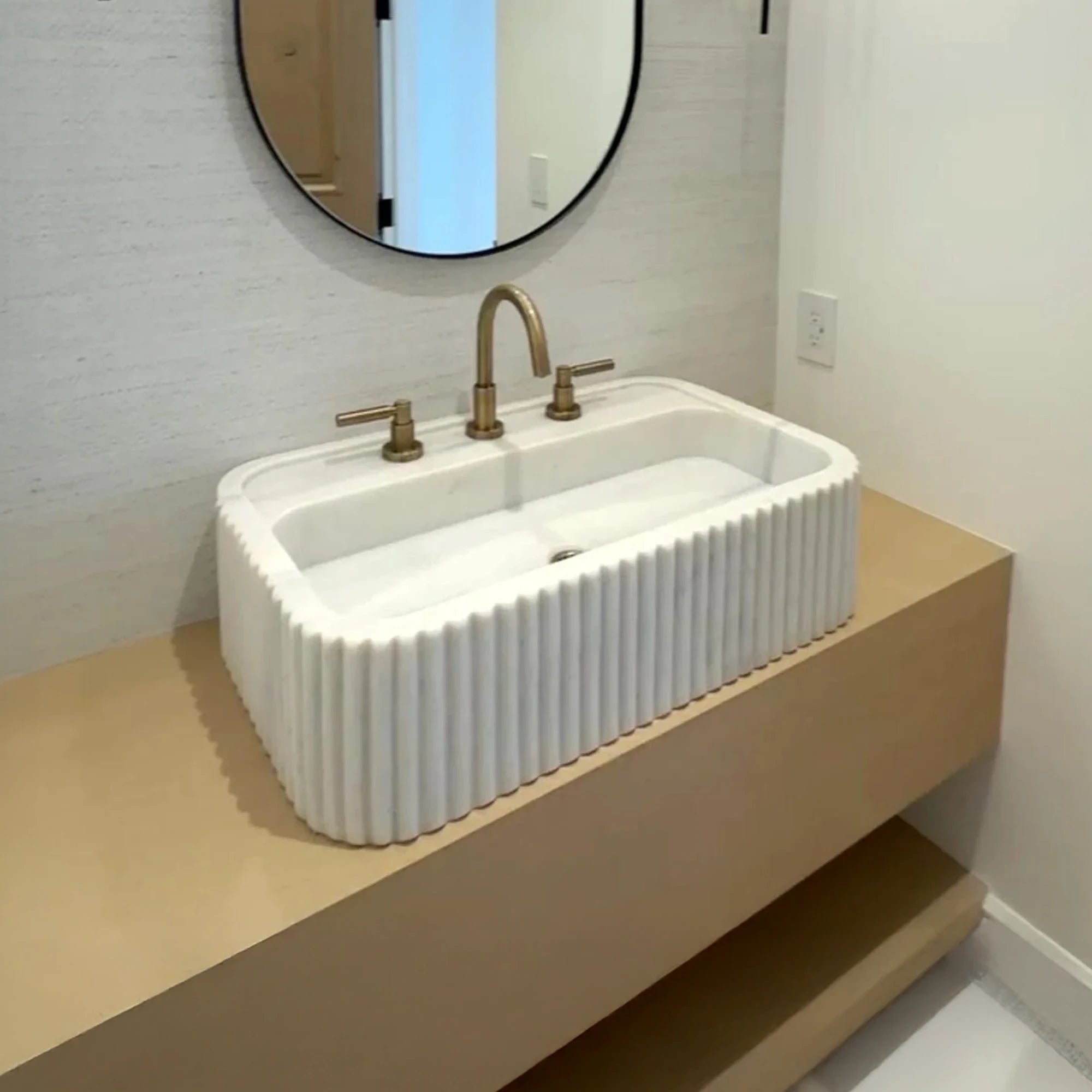 Handcrafted Marble Sink with Floating Wall-Mounted Vanity