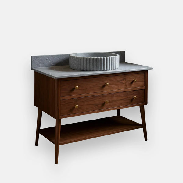 Solid Wood Vanity with Fluted Marble Sink and Brass Fixtures