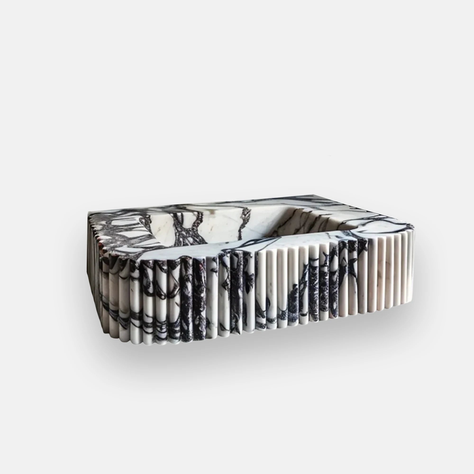 Calacatta Viola marble bathroom sink with bold black veining and fluted front design, handcrafted as a custom vanity washbasin for luxurious interiors.