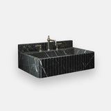 dark veined marble fluted wall mounted sink