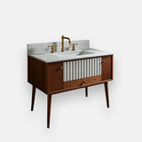 dual material vanity with fluted travertine sink