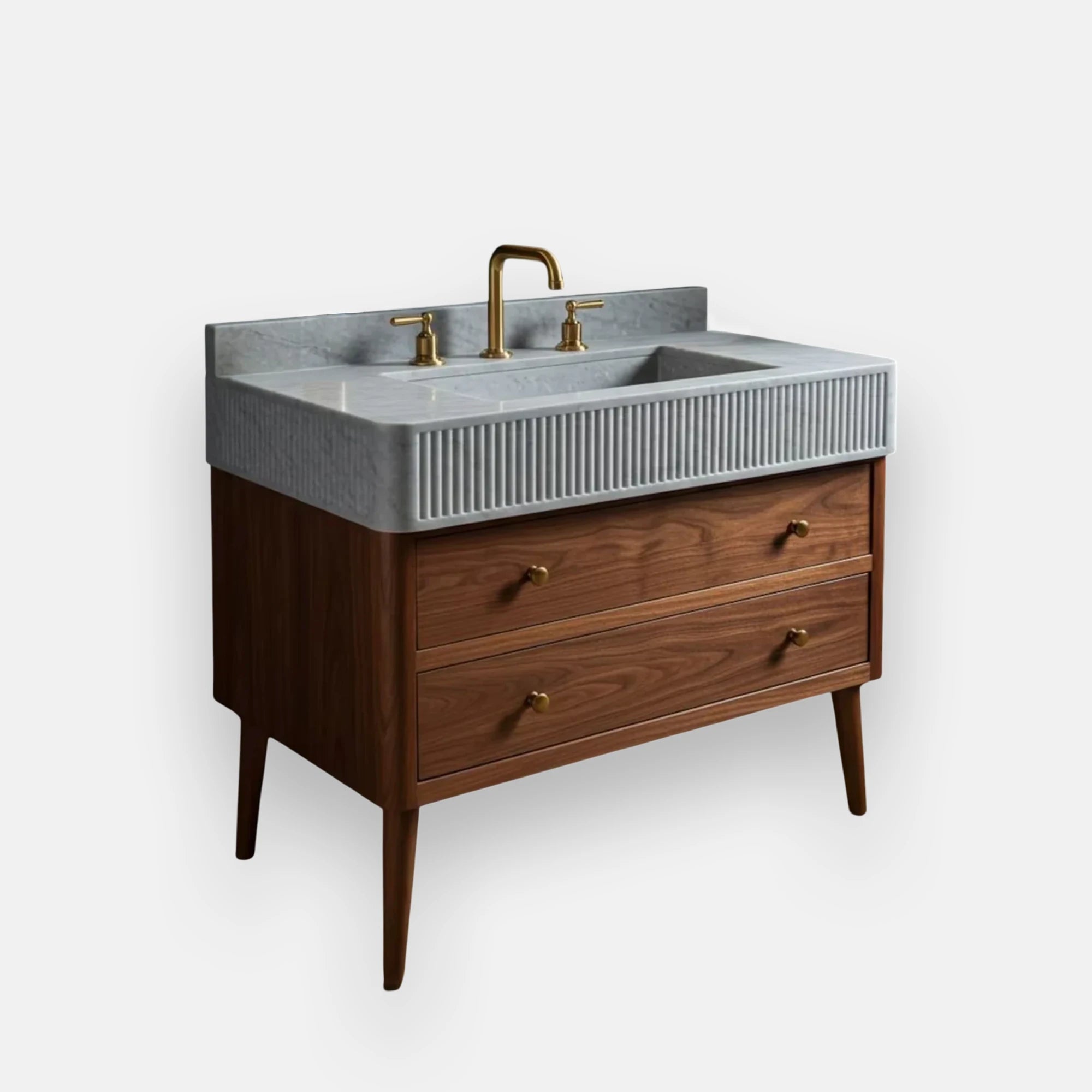 Fluted Carrara marble sink paired with an oak vanity set, featuring a rectangular basin, brass fixtures, and elegant white-gray marble texture for modern bathrooms.