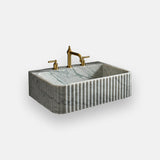 fluted carrara marble wall sink
