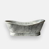 This image shows a Noir marble bathtub with striking gray veining on a white background, crafted for luxurious bathroom interiors.