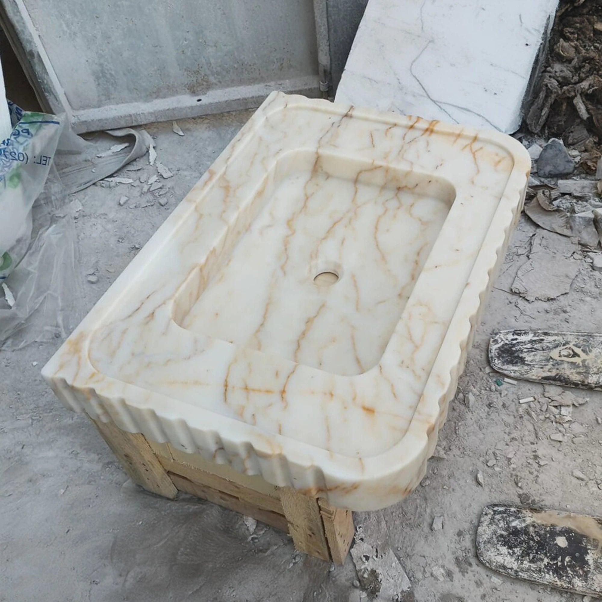 powder room basin in calacatta gold marble