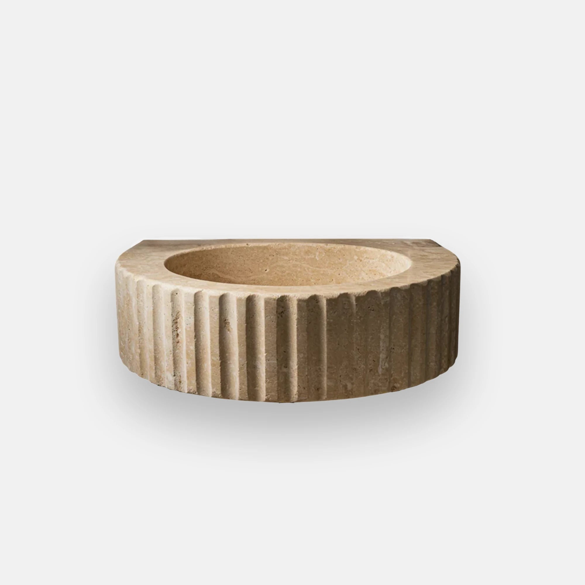 round fluted travertine vessel sink