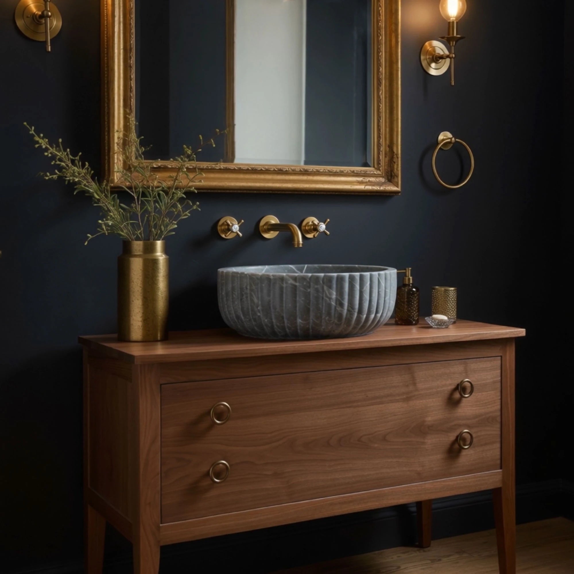 round gray marble sink with fluted exterior