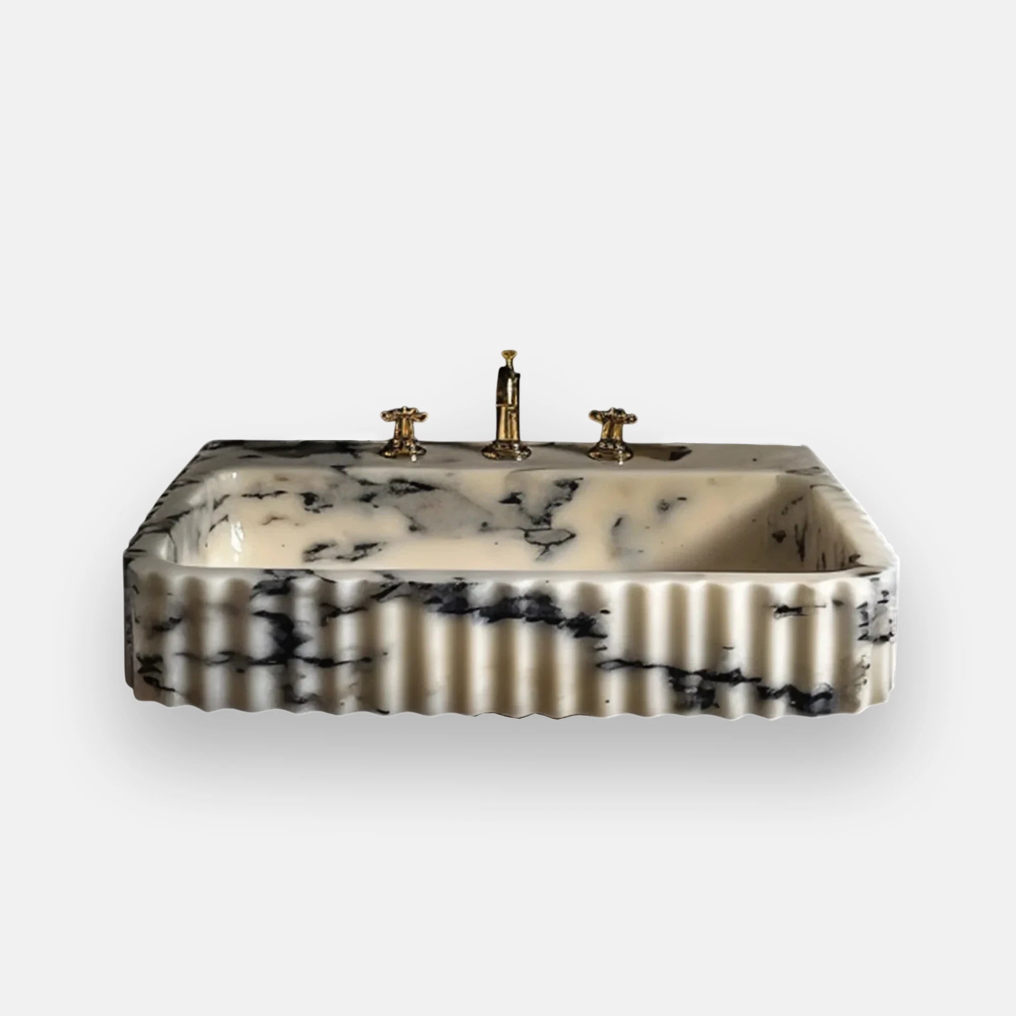Wall mounted Calacatta Viola marble sink with handcrafted fluted design and dramatic black veining, offering a luxurious natural stone statement for modern bathrooms.