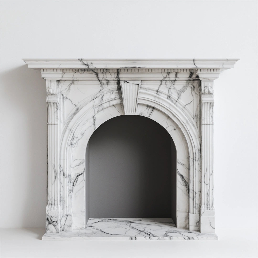 white marble arch fireplace mantel with fluted columns